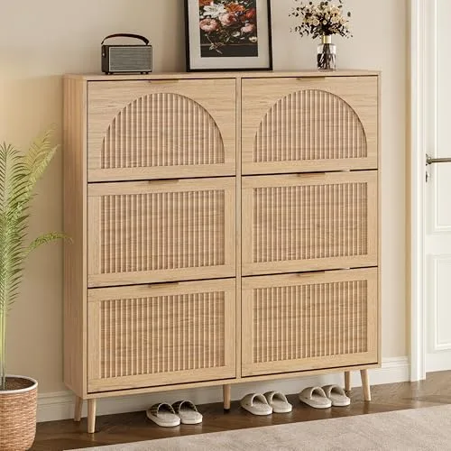Tall arched shoe cabinet in oak standing in a hallway